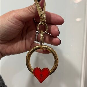 Moncler Gold and Red Heart bag charm